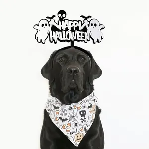 Halloween pet headband and bandana set with spooky graphics on a black dog