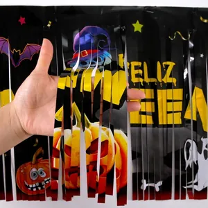 Spanish Feliz Halloween black foil fringe curtain with pumpkin and ghost prints
