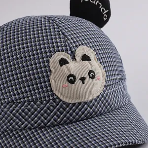 Kids blue checkered baseball cap featuring a cute panda patch and embroidery detail