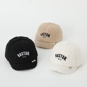 Winter fleece baseball caps for kids featuring BOSTON embroidery in three neutral colors