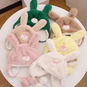 Detail view of plush winter hats for kids with long rabbit ears in six different colors