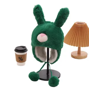 Plush winter rabbit ear trapper hat for kids in dark green with warm pom-pom straps