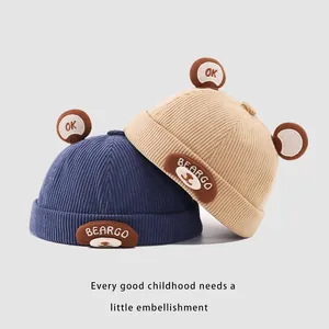 Winter corduroy baby beanie hats with bear patch and cute ears in navy and beige