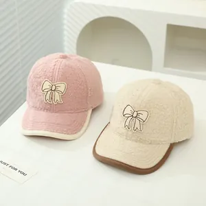 Cozy winter sherpa baseball cap for girls with bow embroidery in pink and beige