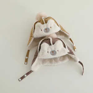 Plush baby aviator hats with bear face embroidery and warm faux fur lining for winter