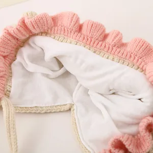 Winter baby knit hat with cute rabbit ears and soft cotton lining in pink and beige