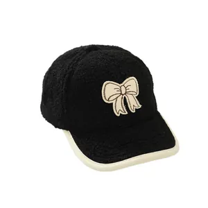 Winter faux shearling baseball cap for girls with white bow embroidery and trim