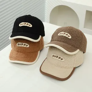 Close-up of four colors of fluffy lambswool baseball caps with PUPPY embroidery and piping