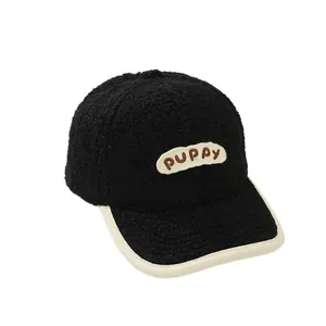 Kids black faux lamb wool baseball cap with PUPPY letter embroidery and cream trim