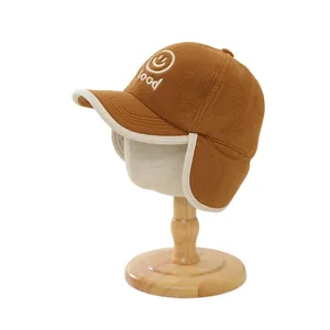 Casquette d'hiver marron en peluche avec cache-oreilles et broderie sourire Good