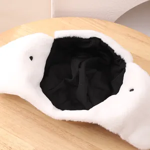 Winter faux fur trapper hat for kids with warm white plush exterior and black quilted lining