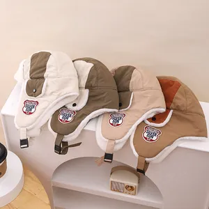 Winter windproof trapper hats for kids with warm fleece lining and ear flaps in four colors