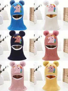 Detailed grid showing six colorful dinosaur knit balaclavas with pom-poms and unicorn prints