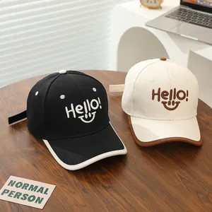 Kids baseball cap with Hello smile embroidery and contrast brim in black and beige