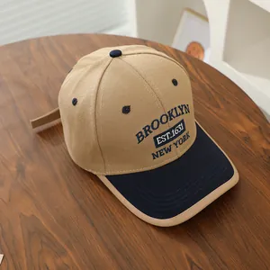 Kids' khaki and navy blue color-block baseball cap with Brooklyn embroidery on wood