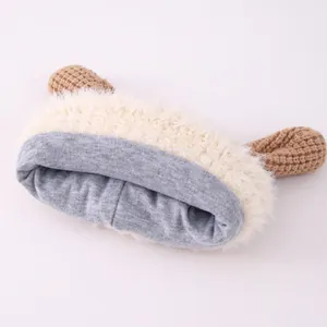 Winter plush baby hat with cute long animal ears and thick fleece lining for warmth