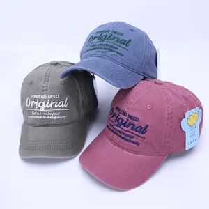Three embroidered cotton baseball caps in navy, grey, and burgundy for children