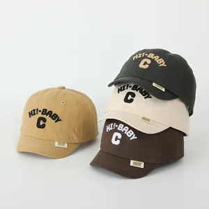 Detailed embroidery of 'HI!-BABY' and letter 'C' on soft-brim cotton baby baseball caps