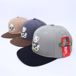 Kids flat brim hip hop caps with 3D rubber bear patches and contrasting visors