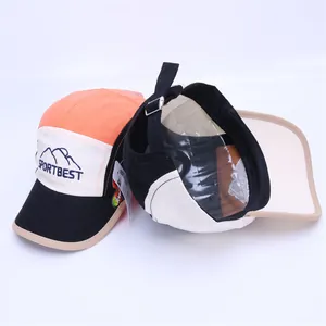 Detail of color-block kids baseball cap featuring metal buckle and SPORTBEST logo embroidery