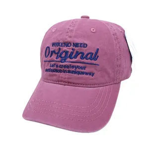 Deep pink baseball cap with blue embroidery and curved brim on white background