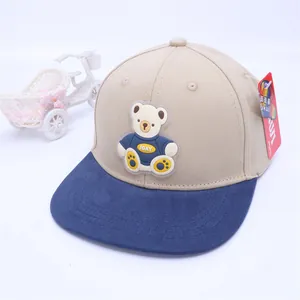 Kids flat brim baseball hat with 3D silicone bear patch in beige and navy blue colors