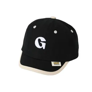 Kids black baseball cap with white G letter and daisy embroidery for summer sun protection