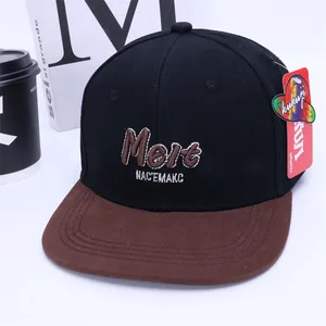 Detail of flat brim baseball cap featuring 3D embroidery and stylish contrast colors