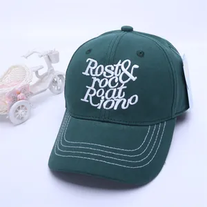 Detailed embroidery and double-stitch brim of dark green kids baseball cap