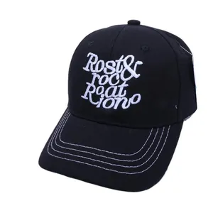 Black cotton baseball cap for kids with white embroidery and stitched brim detail