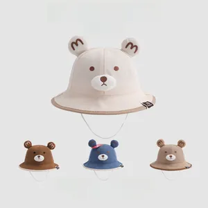 Detail of baby sun hat with cute bear ears and adjustable chin strap in multiple colors