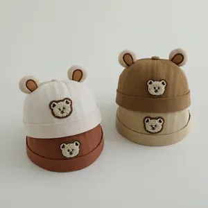 Cute children's bear ear pumpkin hats in four warm colors with soft cotton texture