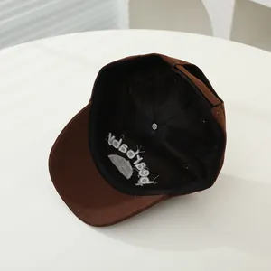 Detail of baby bear baseball cap showing interior sweatband and reinforced stitching