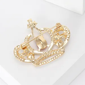 Broche couronne en cristal doré élégante pour costumes et robes de soirée chic