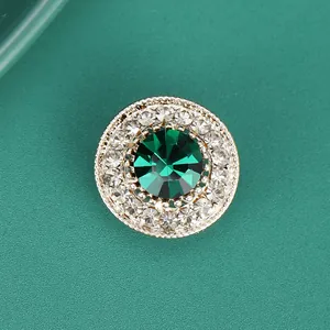 Elegant round emerald crystal brooch with double-row zircon pave in gold-plated setting