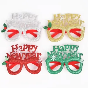 Set di 4 occhiali glitter Happy New Year in oro, argento, rosso e verde per feste di Capodanno