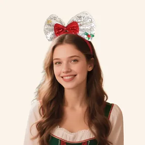 Serre-tête de Noël avec grand nœud à paillettes rouges et argentées et houx festif