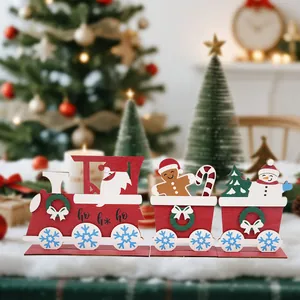 Wooden Christmas train centerpiece with Santa and gingerbread man on holiday backdrop