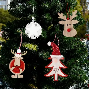 Set of 4 rustic wooden Christmas ornaments featuring reindeer and stars on a green tree