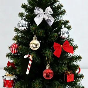 Christmas tree decoration set with red balls, silver bows and candy canes ornaments