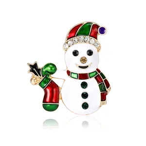 Broche de Noël bonhomme de neige plaquée or avec émail coloré et cristaux brillants