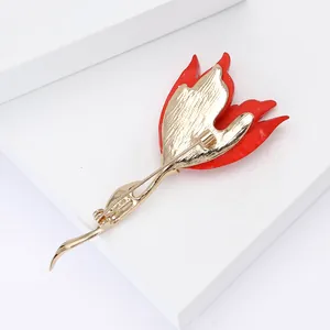 Detailed back view of a red tulip brooch featuring a secure gold metal pin clasp