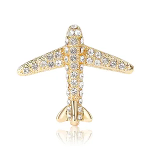 Élégante broche avion en or avec strass blancs brillants pour accessoires de robe
