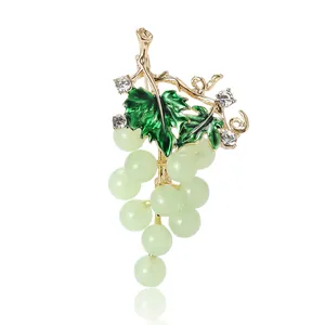 Elegant gold grape brooch with green enamel leaves and sparkling crystals for women