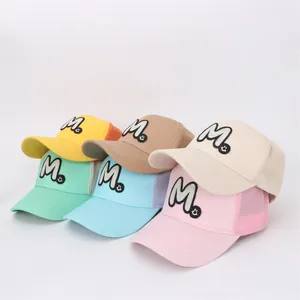 Collection of kids breathable mesh baseball caps with M embroidery in six pastel colors