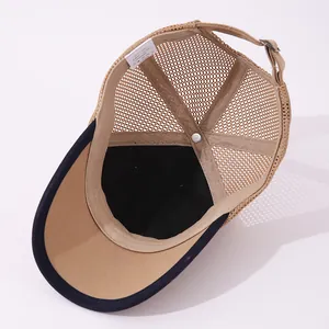 Detail view of breathable mesh lining and adjustable metal buckle on kids baseball cap