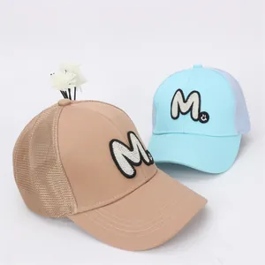 Breathable mesh trucker hats with M embroidery in khaki and light blue colors
