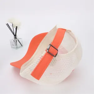 Detail view of the breathable mesh back and adjustable metal buckle on this kids baseball cap