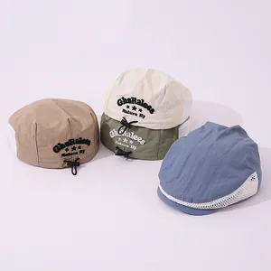 Detail showing assorted breathable mesh beret hats with adjustable front drawstring cords