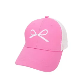 Pink and white mesh baseball cap for girls with an embroidered white bow pattern